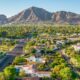 Aerial view of the Arcadia neighborhood of Phoenix with Camelback Mountain in the distance.